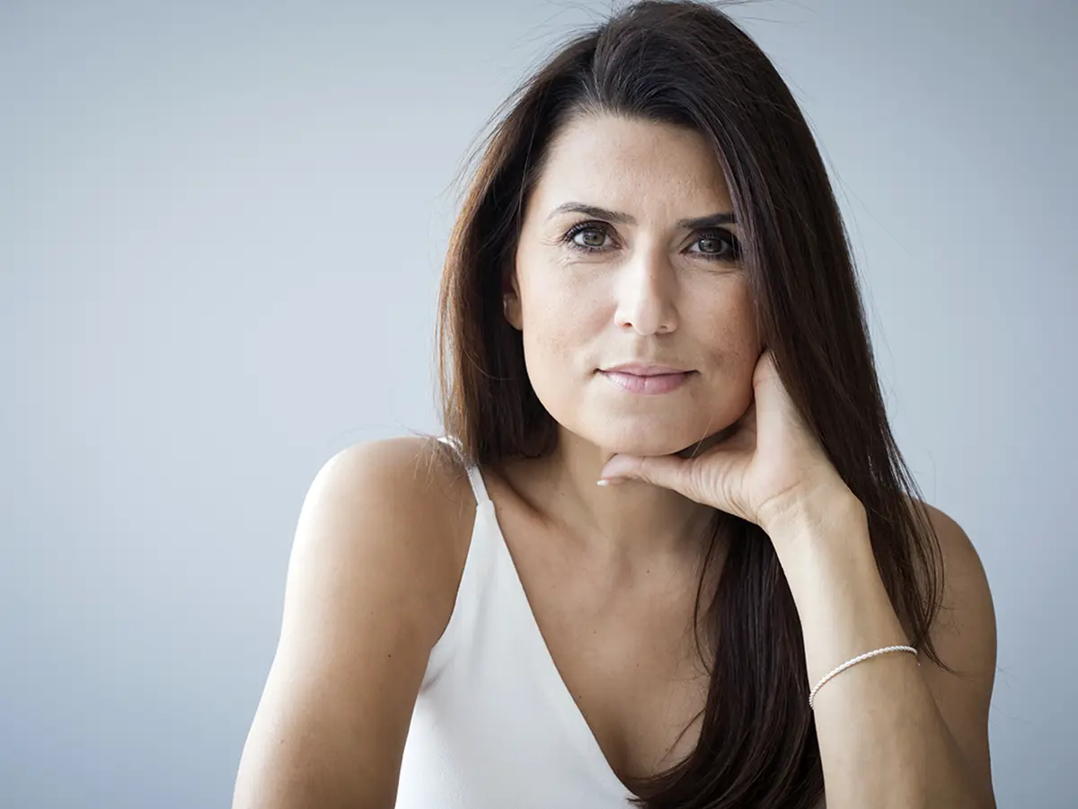 Pasienthistorier, bilde av en vakker moden dame som smiler