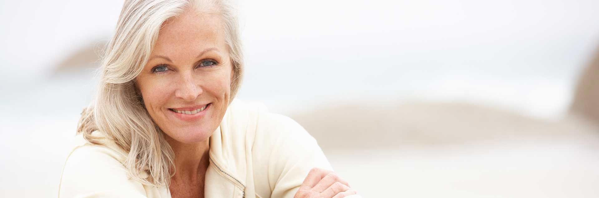 Pasienthistorier, bilde av en vakker moden dame som smiler